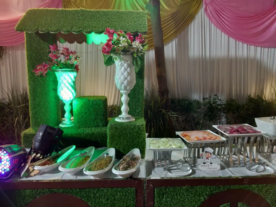 Buffet and dining setup on the lawn at Tithee Banquets